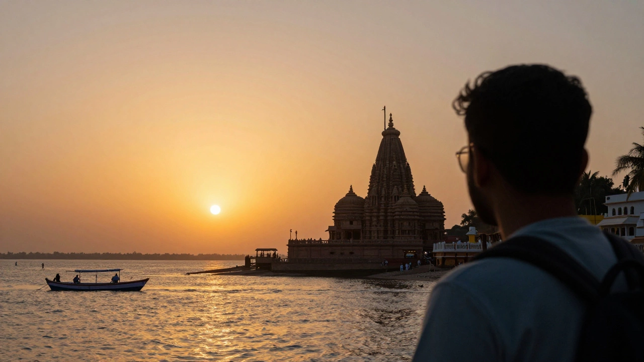 Dwarkadhish Temple spire during a golden sunset over the Arabian Sea in Gujarat.